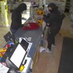 screenshot from security video showing juveniles burglarizing a business