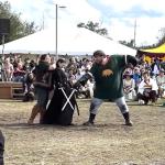 performers swordfight at hoggetowne medieval faire in gainesville