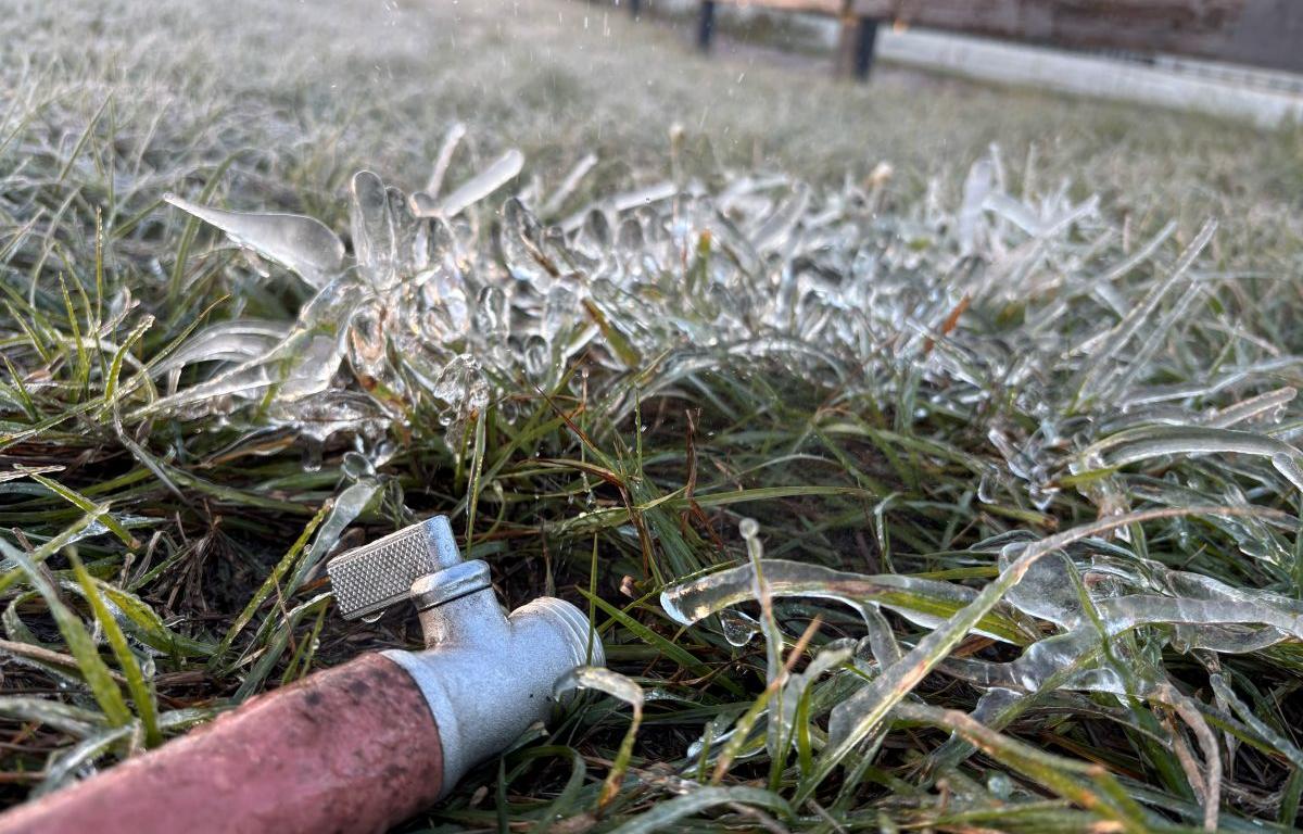 cold weather causes water running from a hose to freeze
