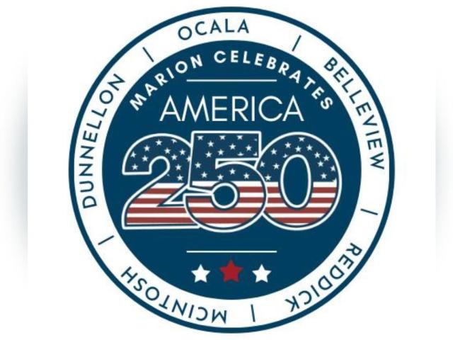 Circle, with insignia, blue lettering in white background. In middle, red, white and blue number, white lettering on blue background, white and red stars on blue background.