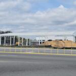 A construction site with supports for a gas station on-site.