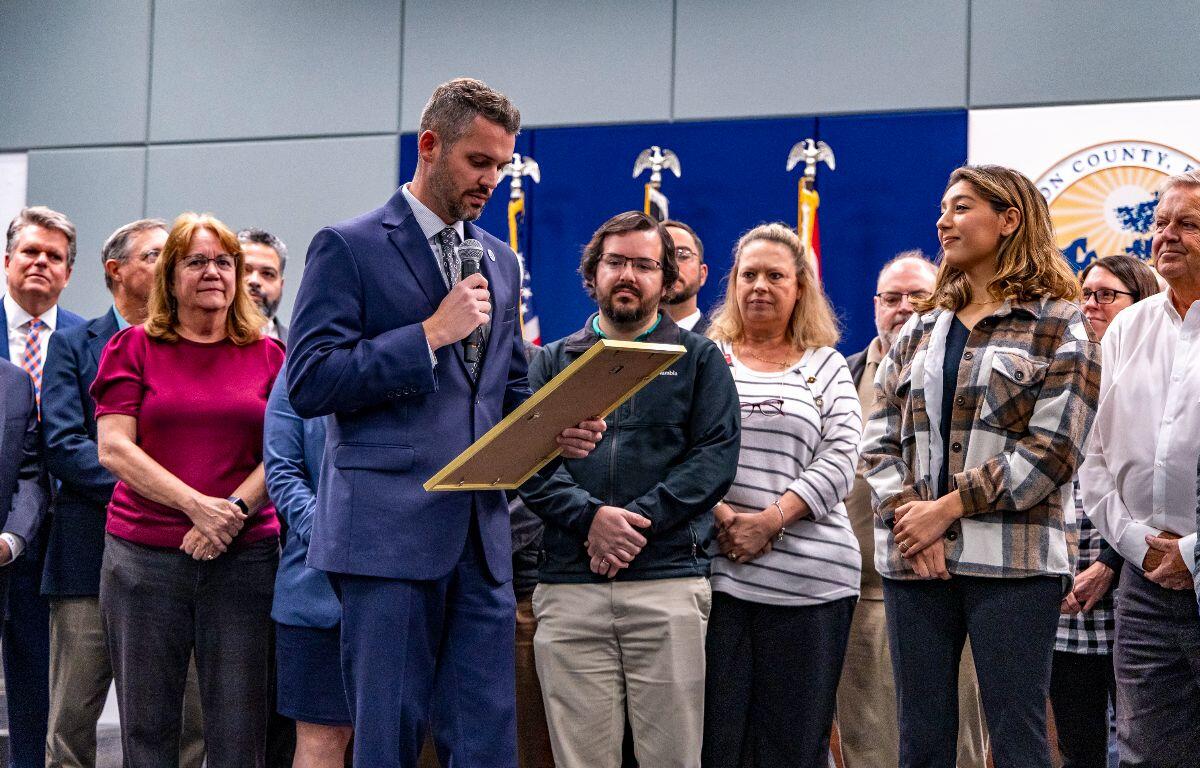 County Commissioner Matt McClain reads the Engineers Week proclamation into the record during the Feb. 17 county commission meeting, and is joined on stage by engineers across multiple county departments.