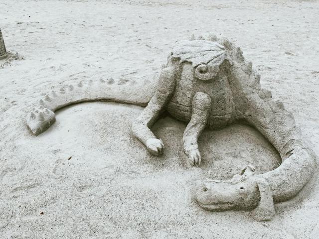 sand sculpture of a dragon to illustrate new Ocala sand and sun festival