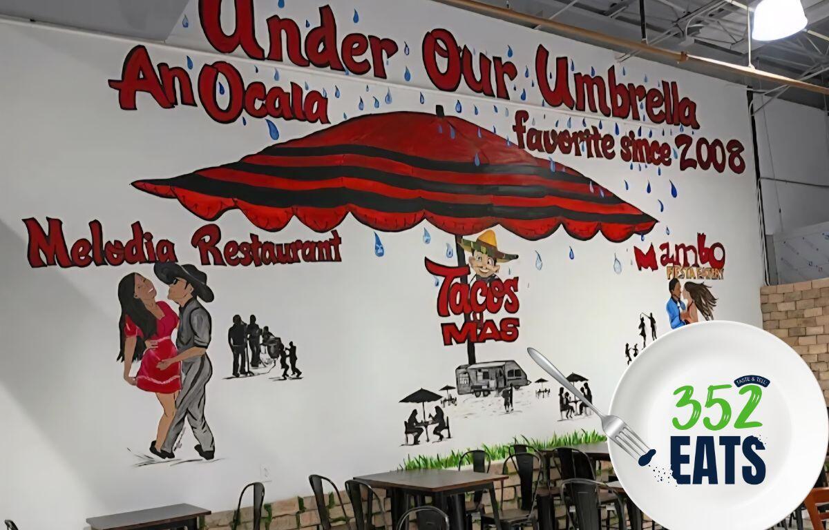 A mural with a red umbrella that reads, "Under One Umbrella - An Ocala favorite since 2008"