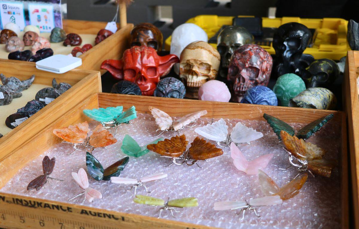 Minerals are shaped into butterflies and skulls.