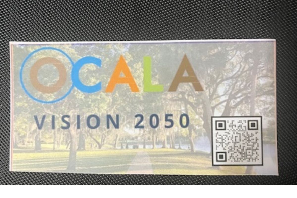 Black background with graphics set on image of live oak trees in the background and a QR code in the bottom right corner. 