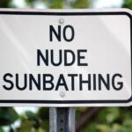 no nude sunbathing sign naturist community american association for nude recreation