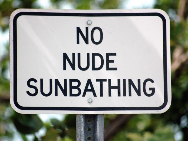 no nude sunbathing sign naturist community american association for nude recreation