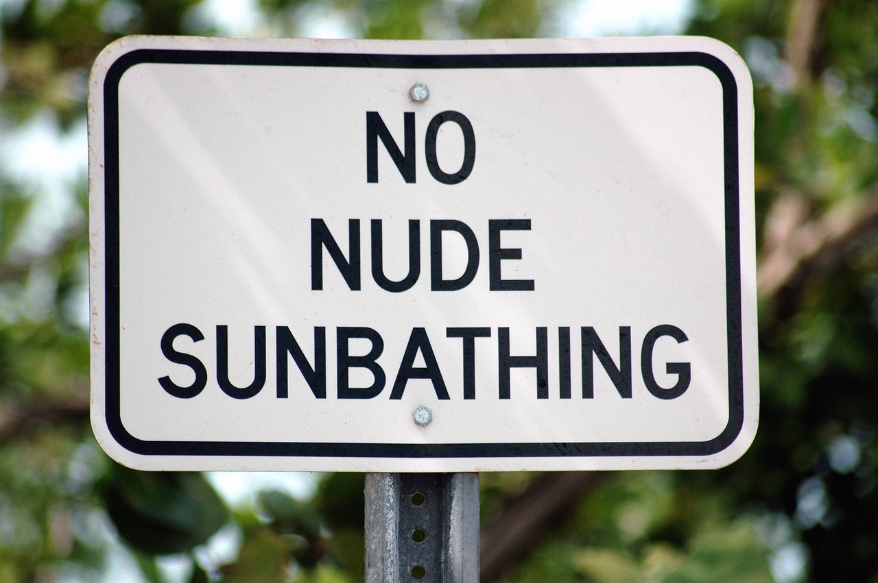 no nude sunbathing sign naturist community american association for nude recreation