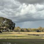 sunny afternoon with a thunderstorm on the horizon in Summerfield