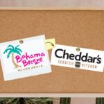 Corkboard with two logos, Bahama Breeze and Cheddars.