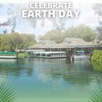 A view of a loading dock with boats floating on clear water in a wooded area sits on top of a green background. In the foreground is white text that reads, "Celebrate Earth Day." Graphics of vines and palm leaves.