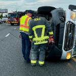 Ocala Fire Rescue officials respond to the scene of a three-vehicle crash involving an overturned ambulance.