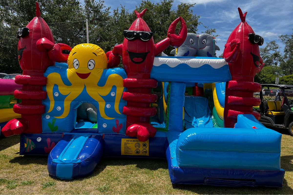 A colored image of a sea-creature themed bounce house.