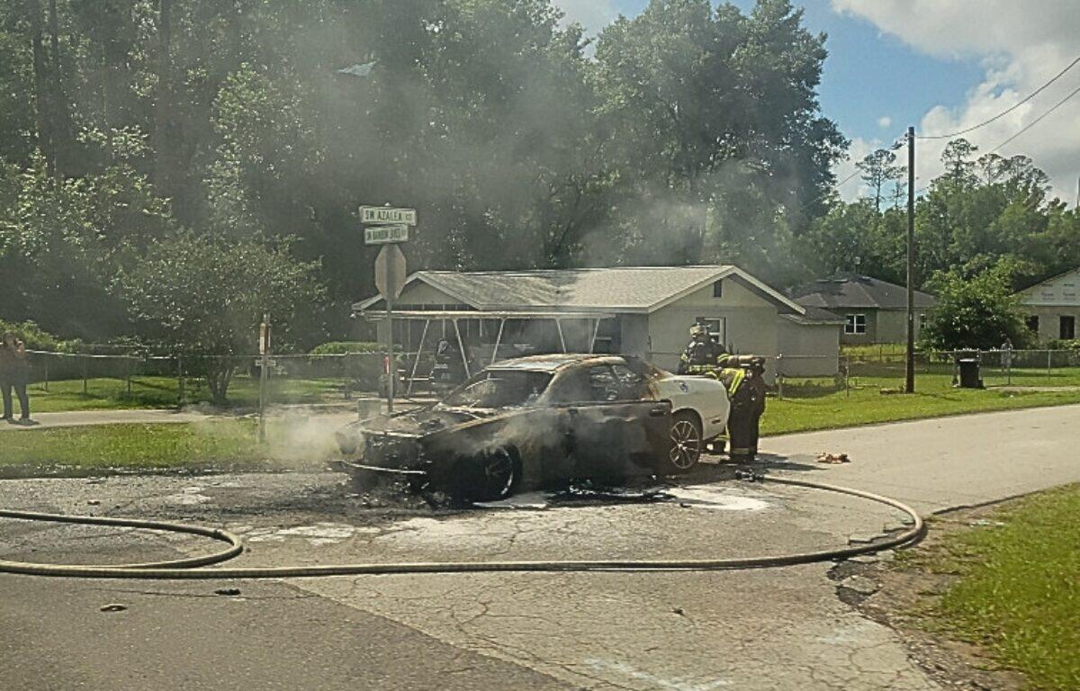 An extinguished car fire.