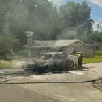 An extinguished car fire.
