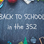 Chalkboard with the text 'Back to School in the 352' surrounded by colorful school supplies like notebooks, scissors, and pencils.