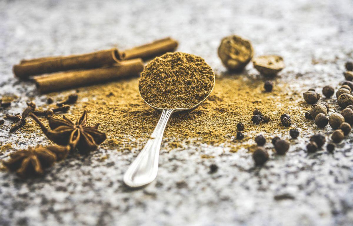 Various fall spices on a counter.