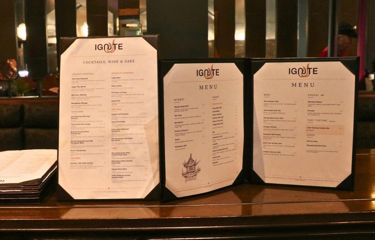 Menus for Ignite on a hostess stand.