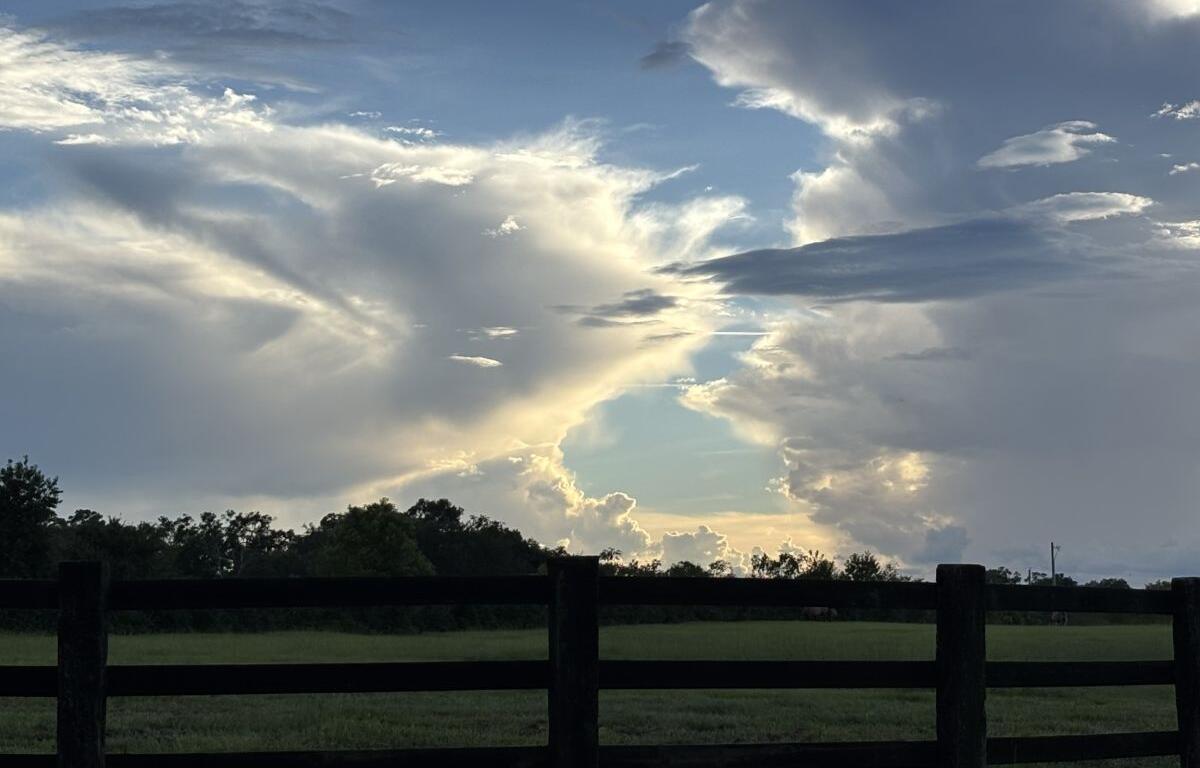 sunset clouds pasture fence summerfield florida
